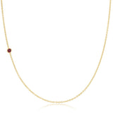 A yellow gold 14K Gold Asymmetrical Birthstone Necklace - Ruby (July) on a white background. 