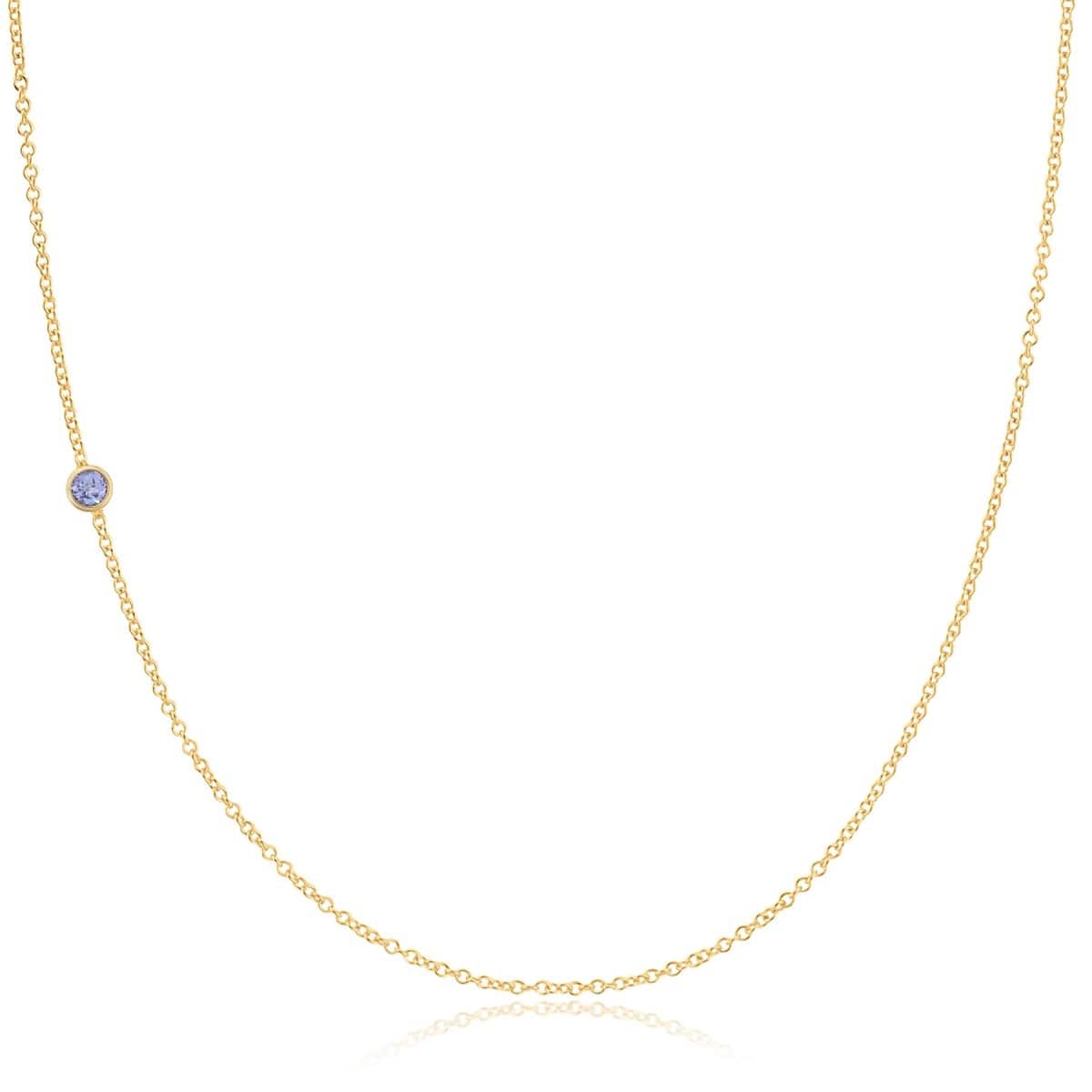 A yellow gold 14K Gold Asymmetrical Birthstone Necklace - Tanzanite (December) on a white background. 