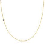 A yellow gold 14K Gold Asymmetrical Birthstone Necklace - Tanzanite (December) on a white background. 