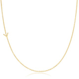 A yellow gold necklace with a Y letter charm on a white background. 