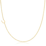A yellow gold necklace with a U letter charm on a white background. 
