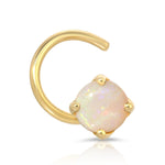 An Alli Webb Opal Comfort Stud on a white background. 