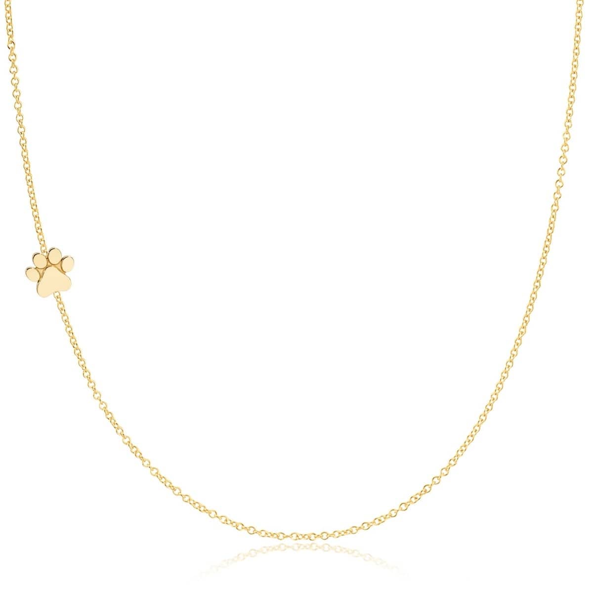 A yellow gold 14k Gold Asymmetrical Charm Necklace - Paw with a cable chain on a white background. 