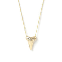 A Sharktooth Necklace with Diamond Ridge in yellow gold on a white background.