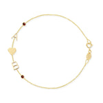 A yellow gold Custom Gold Bracelet - 5 Letters with the letters A and B, a heart charm and two birthstone charms on a white background. 