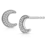 A pair of white gold pave diamond crescent moon stud earring on a white background.