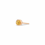 A solid 14k rose gold birthstone stud earring with natural citrine stone set in a 3mm bezel.