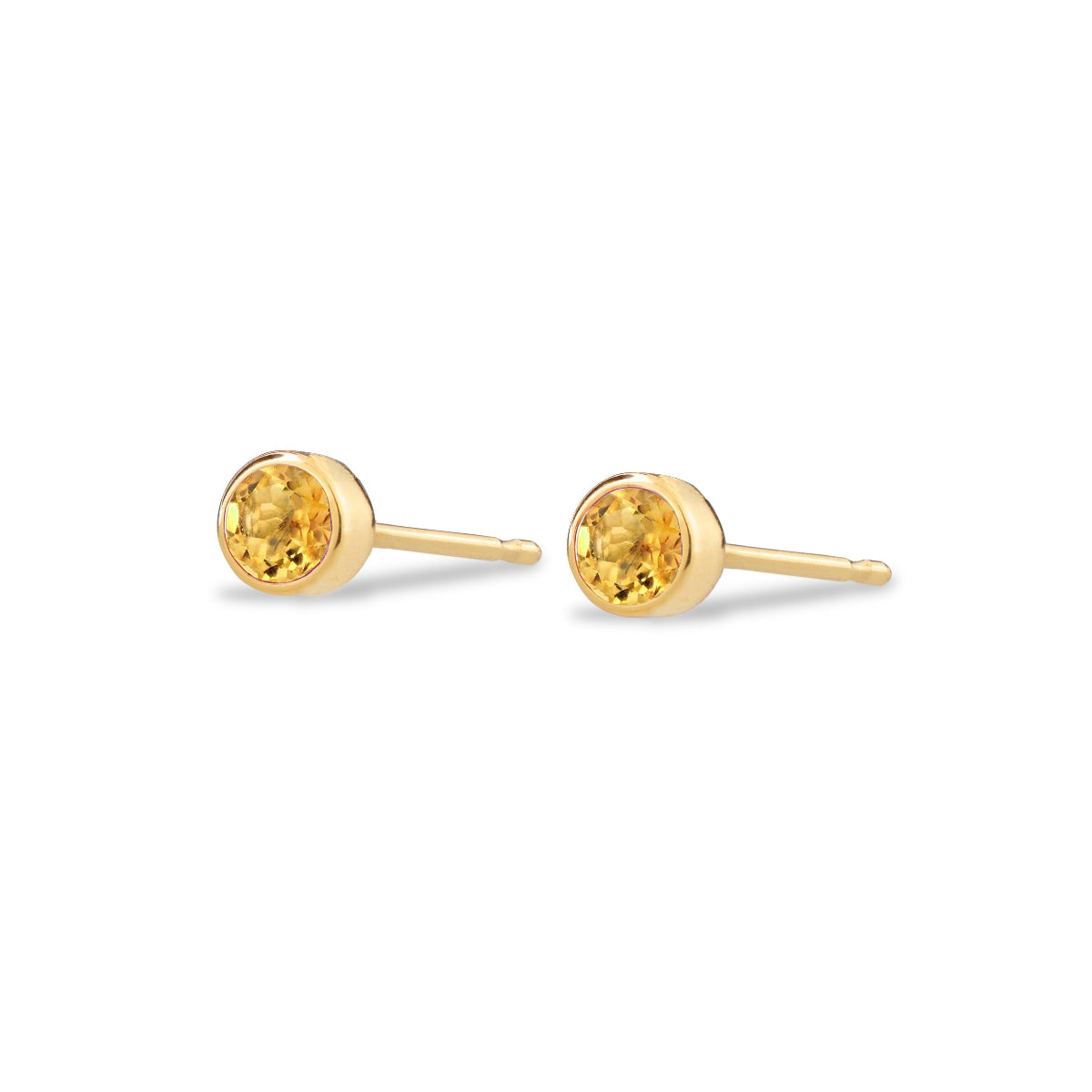 A pair of solid 14k gold birthstone stud earrings with natural citrine stones set in a 3mm bezel.