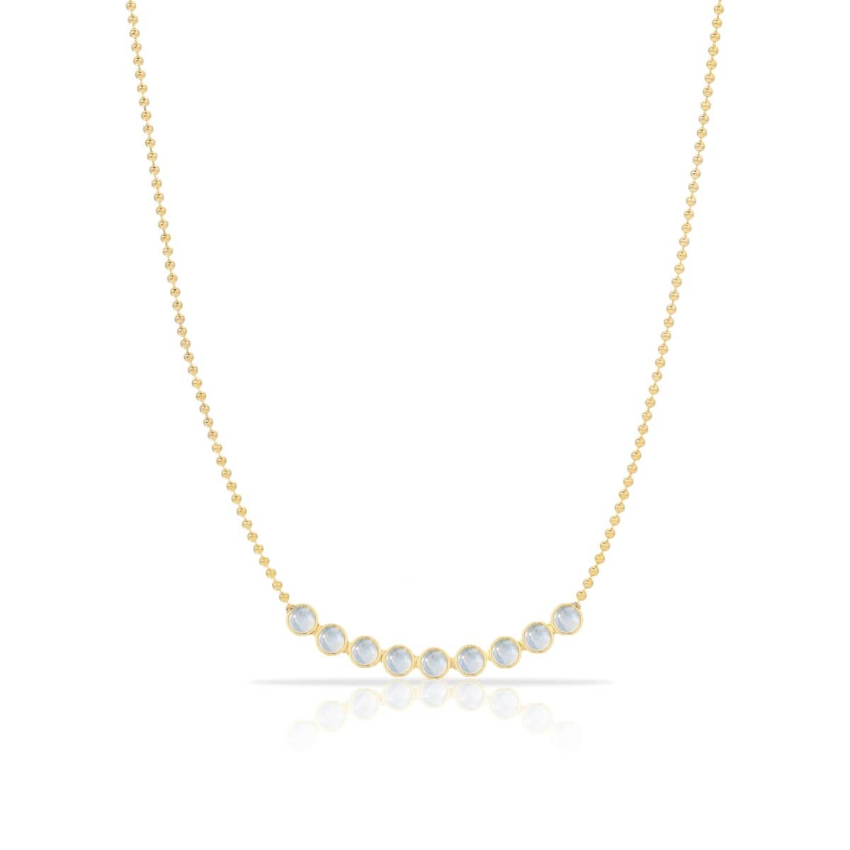 A Birthstone Arc Layering Necklace – Yellow Gold in Moonstone – June on a white background.