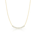 A Birthstone Arc Layering Necklace – Yellow Gold in Moonstone – June on a white background.