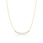 A Birthstone Arc Layering Necklace – Yellow Gold in Opal – October on a white background.