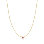 A Single Birthstone Layering Necklace - Yellow Gold in Pink Tourmaline - October on a white background.