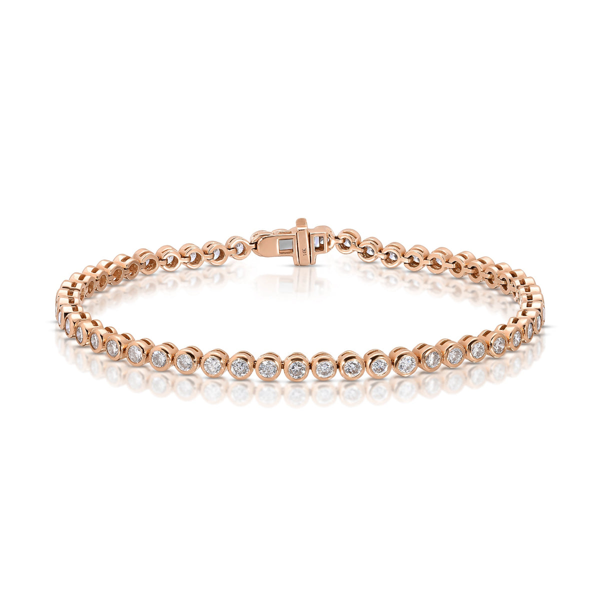 A rose gold tennis bracelet on a white background