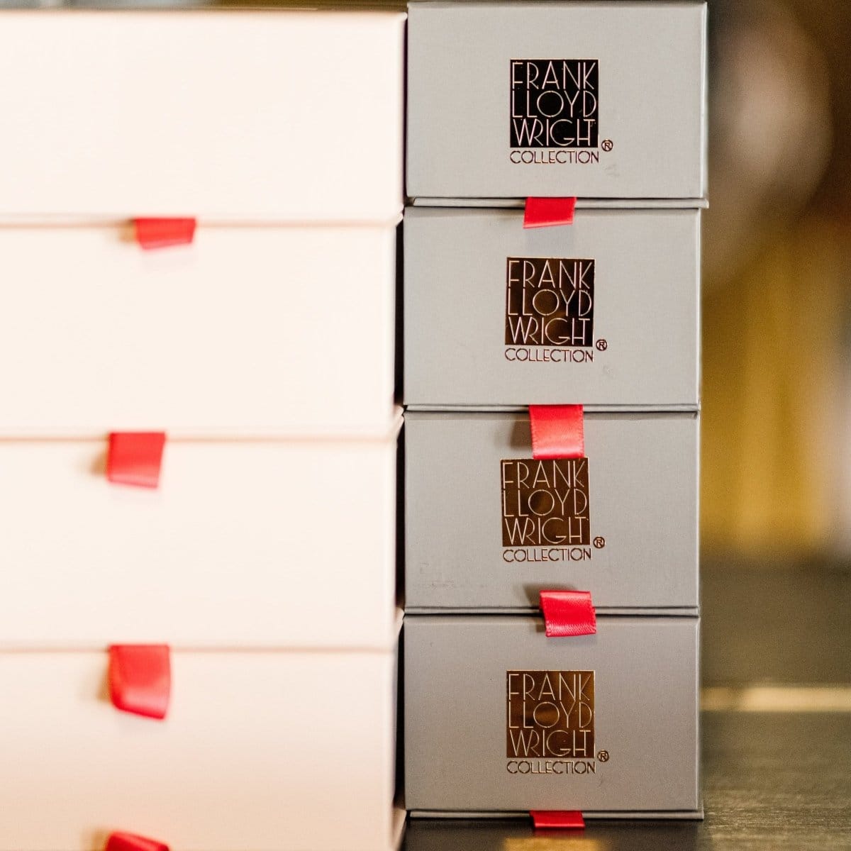 Several Frank Lloyd Wright Collection jewelry boxes stacked. 