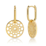 Skylight Hoops in yellow gold on a white background. 