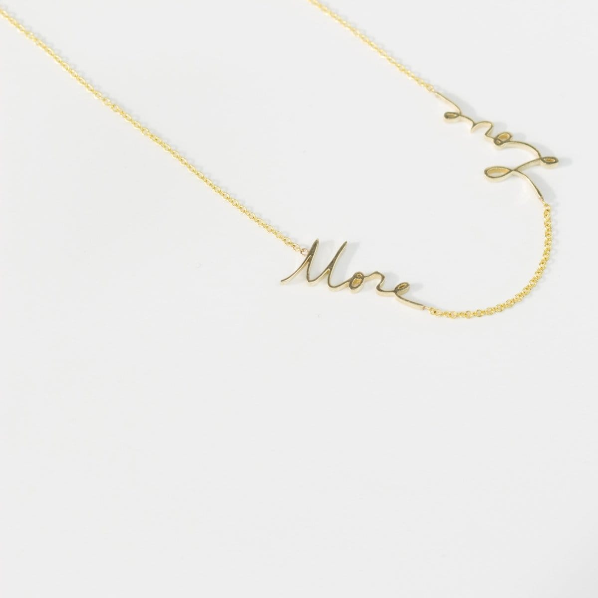 A More Love Necklace on a white background. 