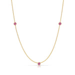 A Triple Birthstone Layering Necklace - Yellow Gold in Pink Tourmaline - October on a white background.