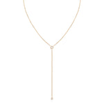A Diamond Drip Necklace in rose gold on a white background. 
