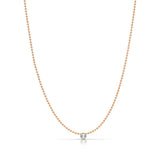 A Single Birthstone Layering Necklace - Rose Gold in Aquamarine on a white background.