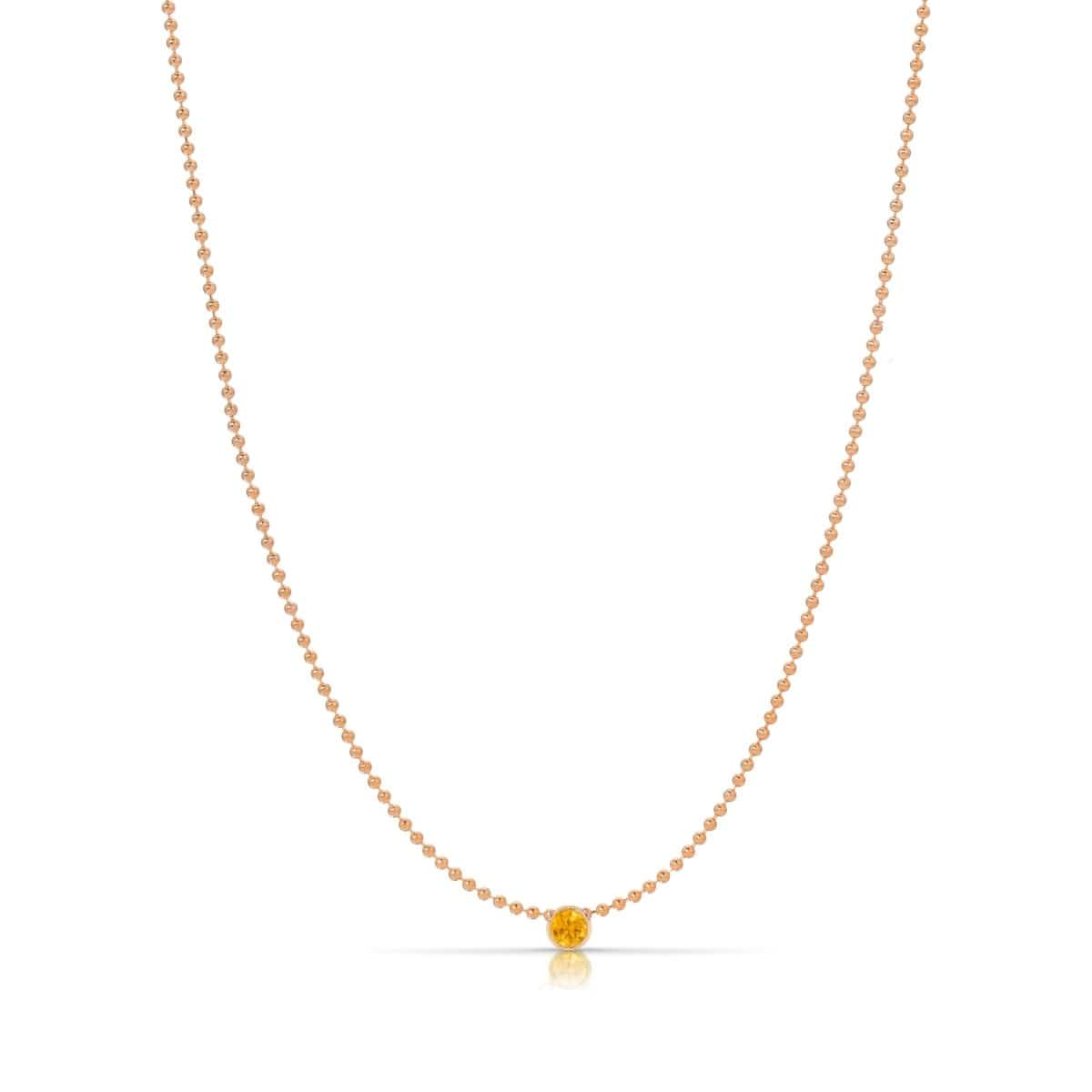 A Single Birthstone Layering Necklace - Rose Gold in Citrine on a white background.