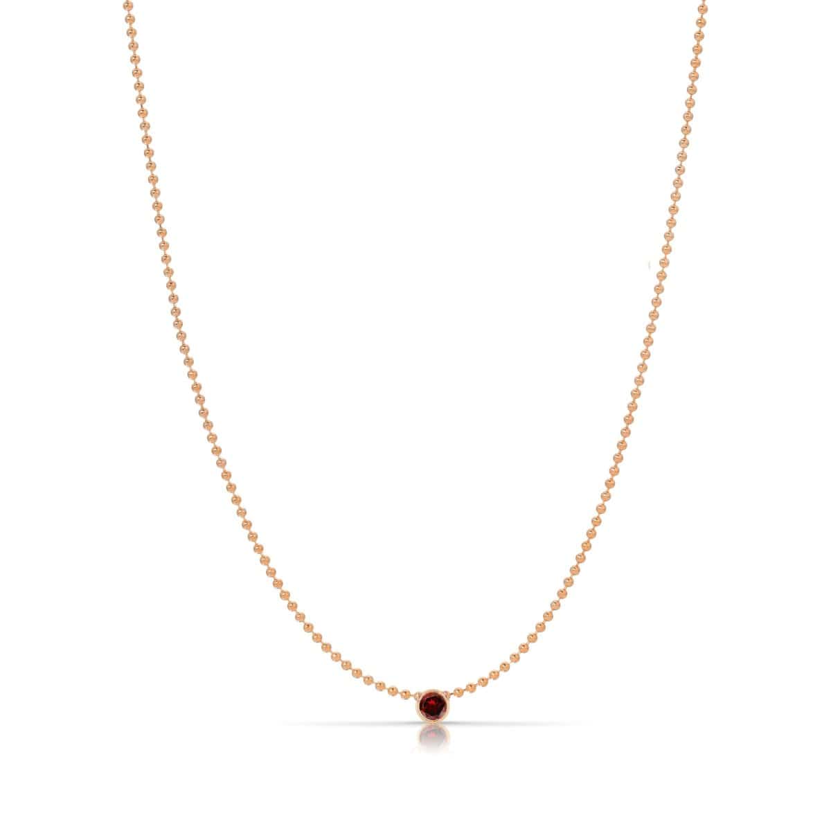 A Single Birthstone Layering Necklace - Rose Gold in Garnet on a white background.
