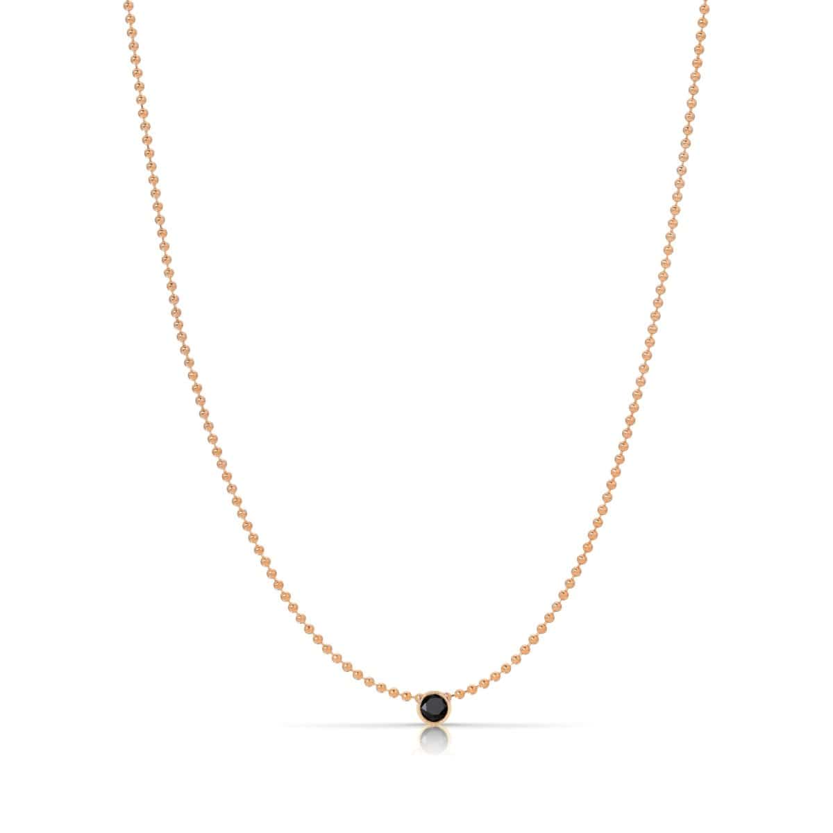 A Single Birthstone Layering Necklace - Rose Gold in Onyx on a white background.
