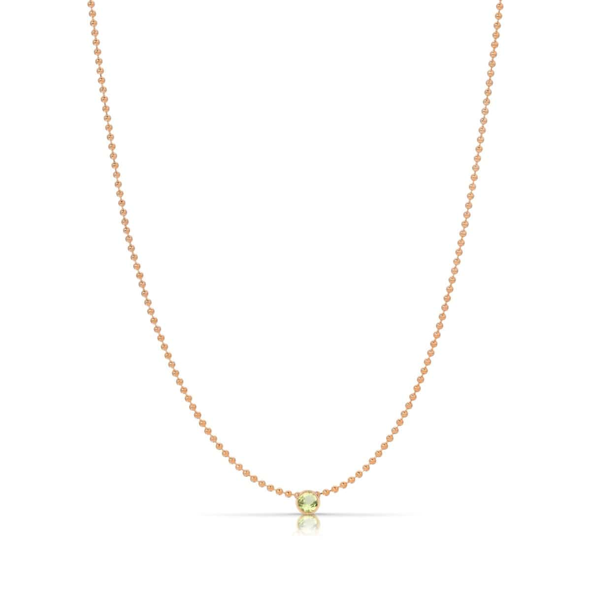 A Single Birthstone Layering Necklace - Rose Gold in Peridot on a white background.