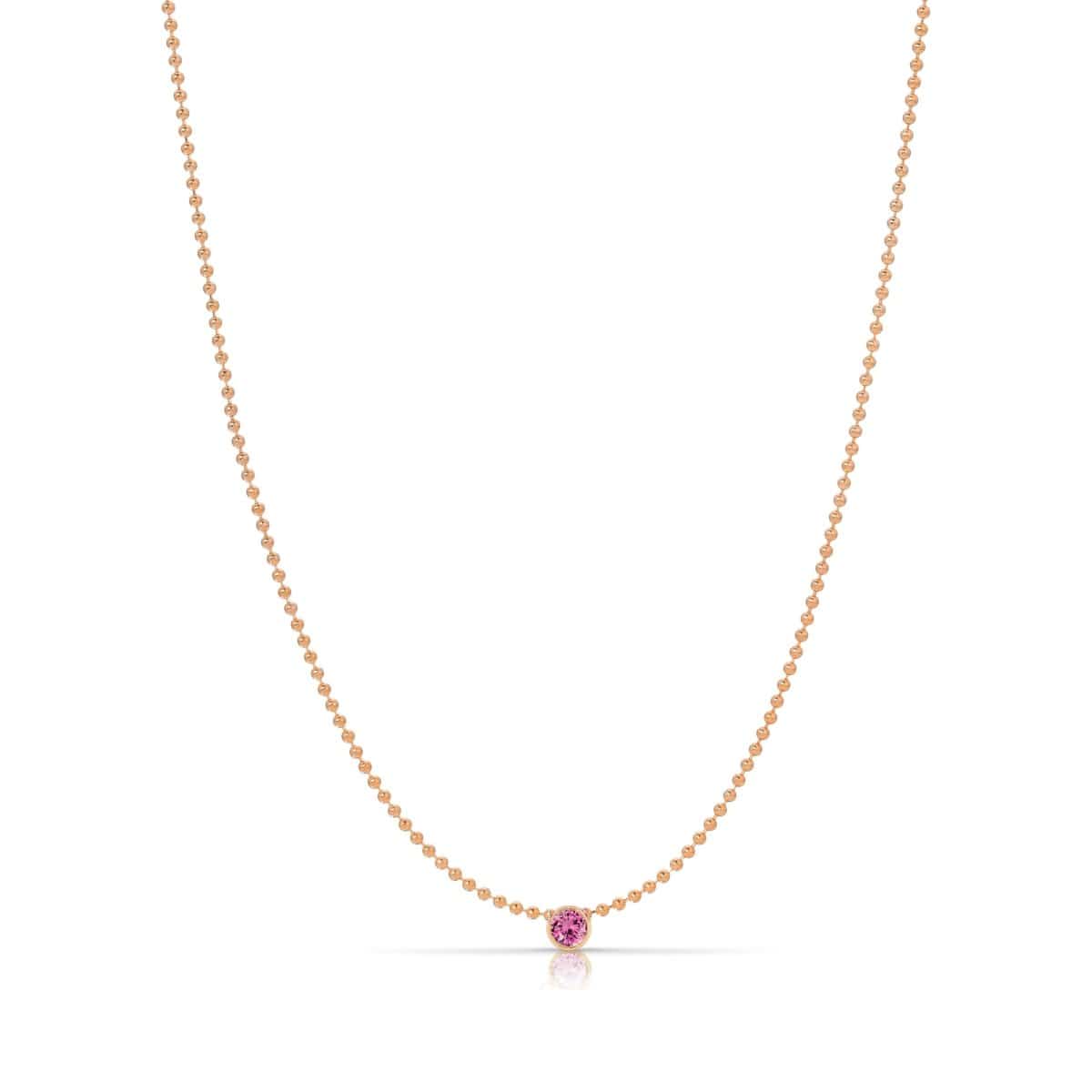 A Single Birthstone Layering Necklace - Rose Gold in Pink Tourmaline on a white background.
