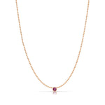 A Single Birthstone Layering Necklace - Rose Gold in Ruby on a white background.