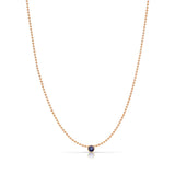 A Single Birthstone Layering Necklace - Rose Gold in Sapphire on a white background.