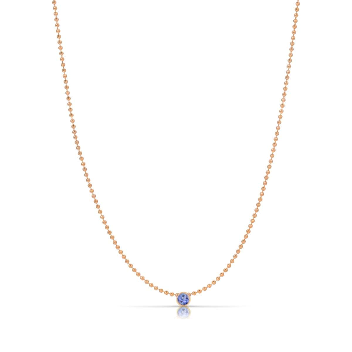 A Single Birthstone Layering Necklace - Rose Gold in Tanzanite on a white background.