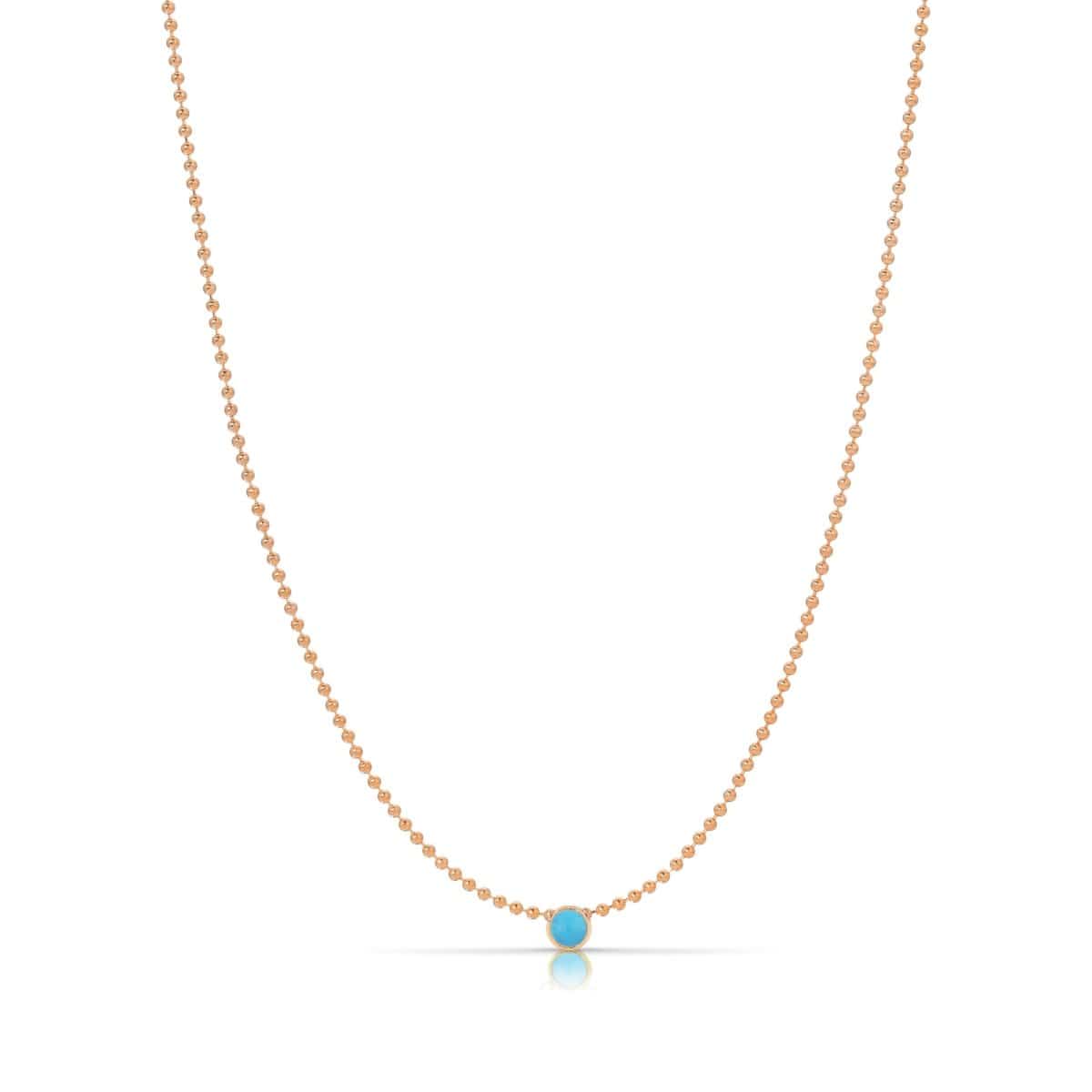A Single Birthstone Layering Necklace - Rose Gold in Turquoise on a white background. 
