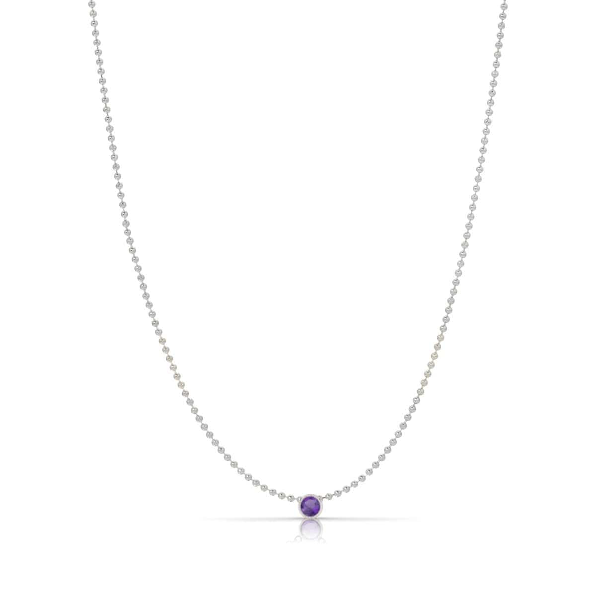 A Single Birthstone Layering Necklace - White Gold in Amethyst on a white background.