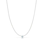 A Single Birthstone Layering Necklace - White Gold in Aquamarine on a white background.