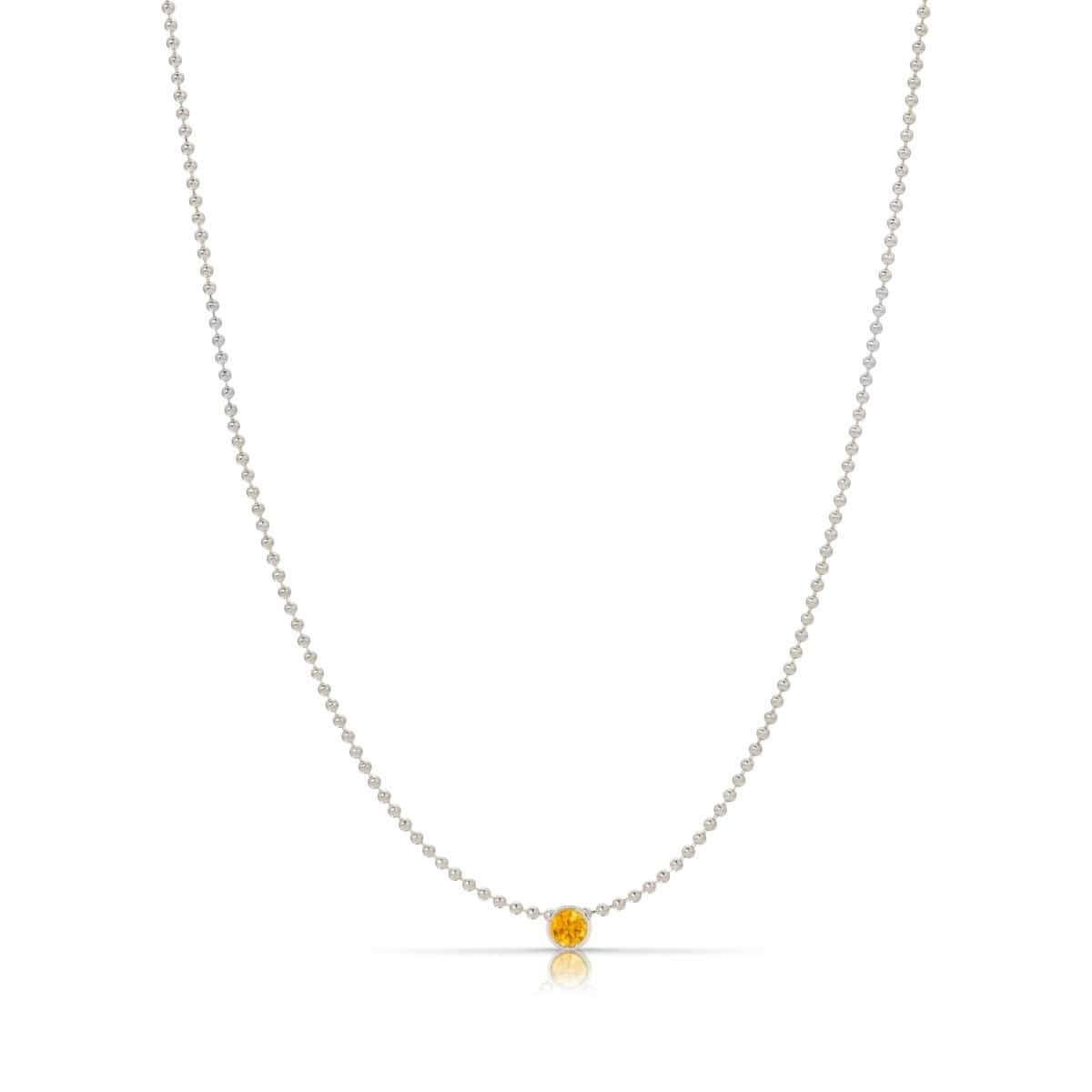 A Single Birthstone Layering Necklace - White Gold in Citrine on a white background.
