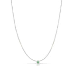 A Single Birthstone Layering Necklace - White Gold in Emerald on a white background.