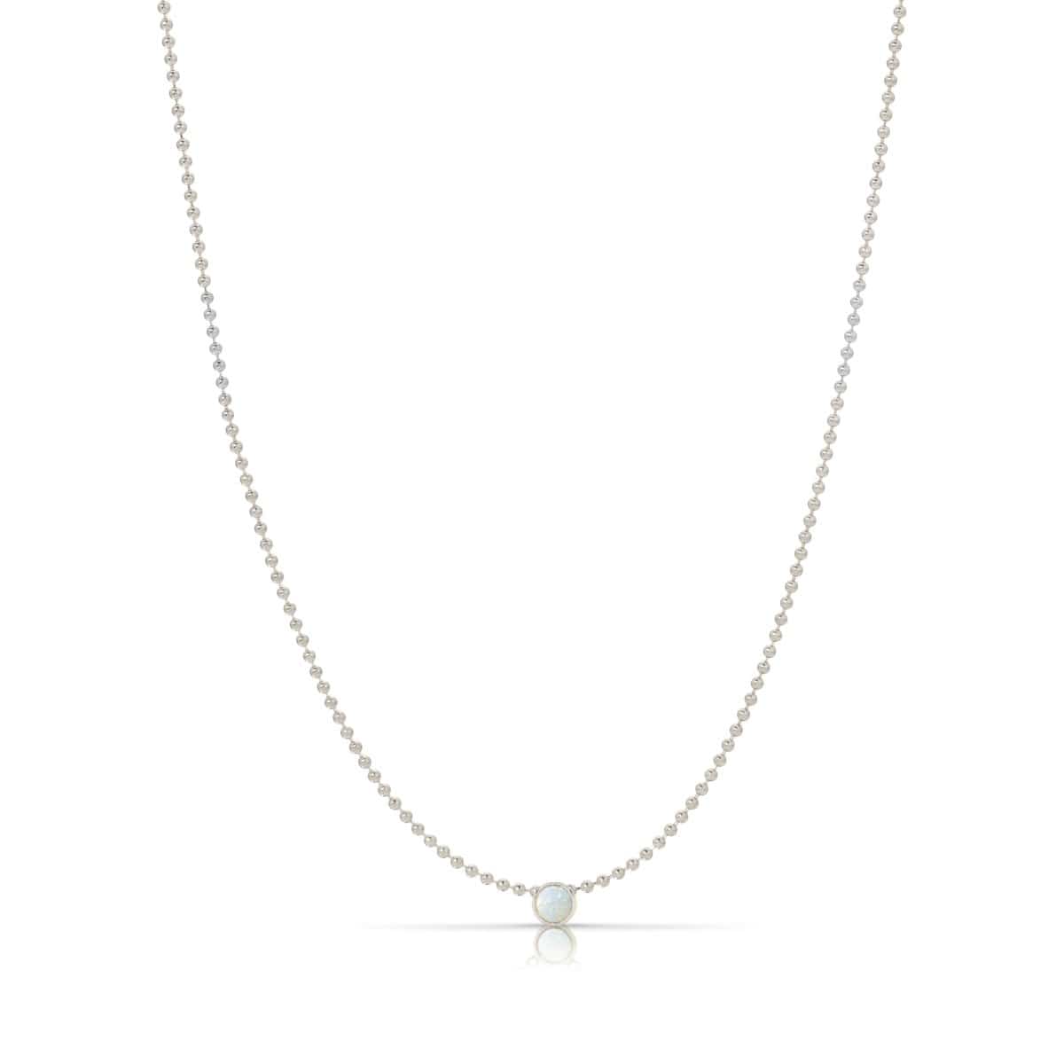 A Single Birthstone Layering Necklace - White Gold in Opal on a white background.