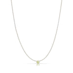 A Single Birthstone Layering Necklace - White Gold in Peridot on a white background.