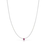 A Single Birthstone Layering Necklace - White Gold in Ruby on a white background.