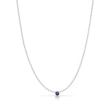 A Single Birthstone Layering Necklace - White Gold in Sapphire on a white background.