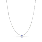 A Single Birthstone Layering Necklace - White Gold in Tanzanite on a white background.