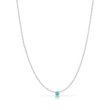 A Single Birthstone Layering Necklace - White Gold in Turquoise on a white background.