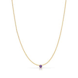 A Single Birthstone Layering Necklace - Yellow Gold in Amethyst - February on a white background.