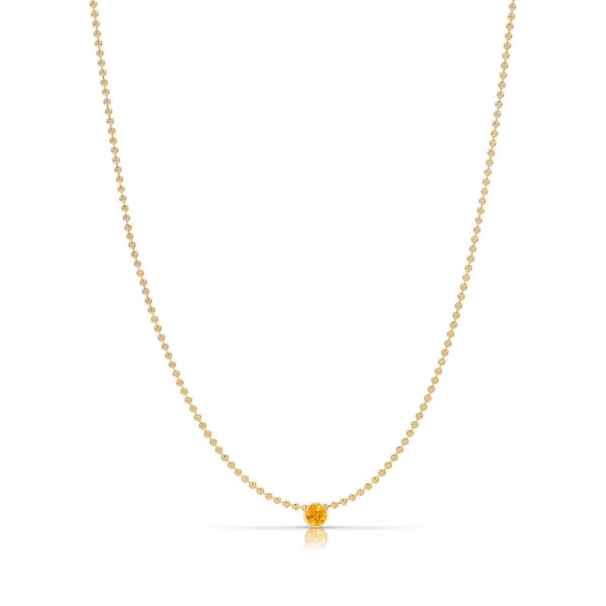 A Single Birthstone Layering Necklace - Yellow Gold in Citrine - November on a white background.