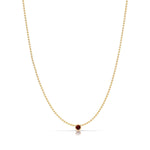  A Single Birthstone Layering Necklace - Yellow Gold in Garnet - January on a white background.