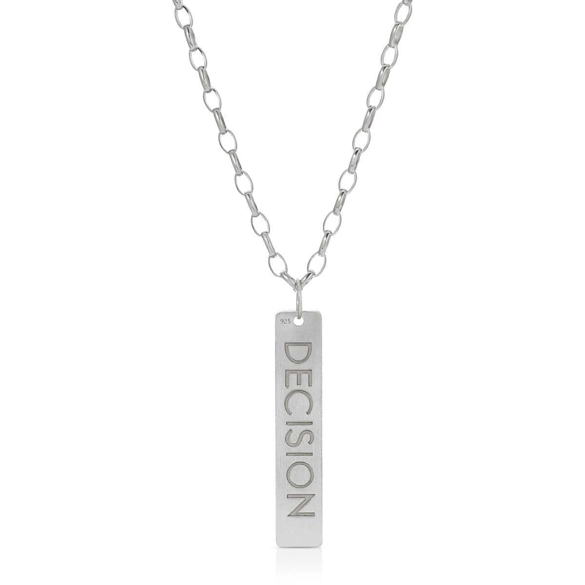 The back of a Virtues Pendant - Rectangle in sterling silver with 'DECISION' engraved on a white background. 
