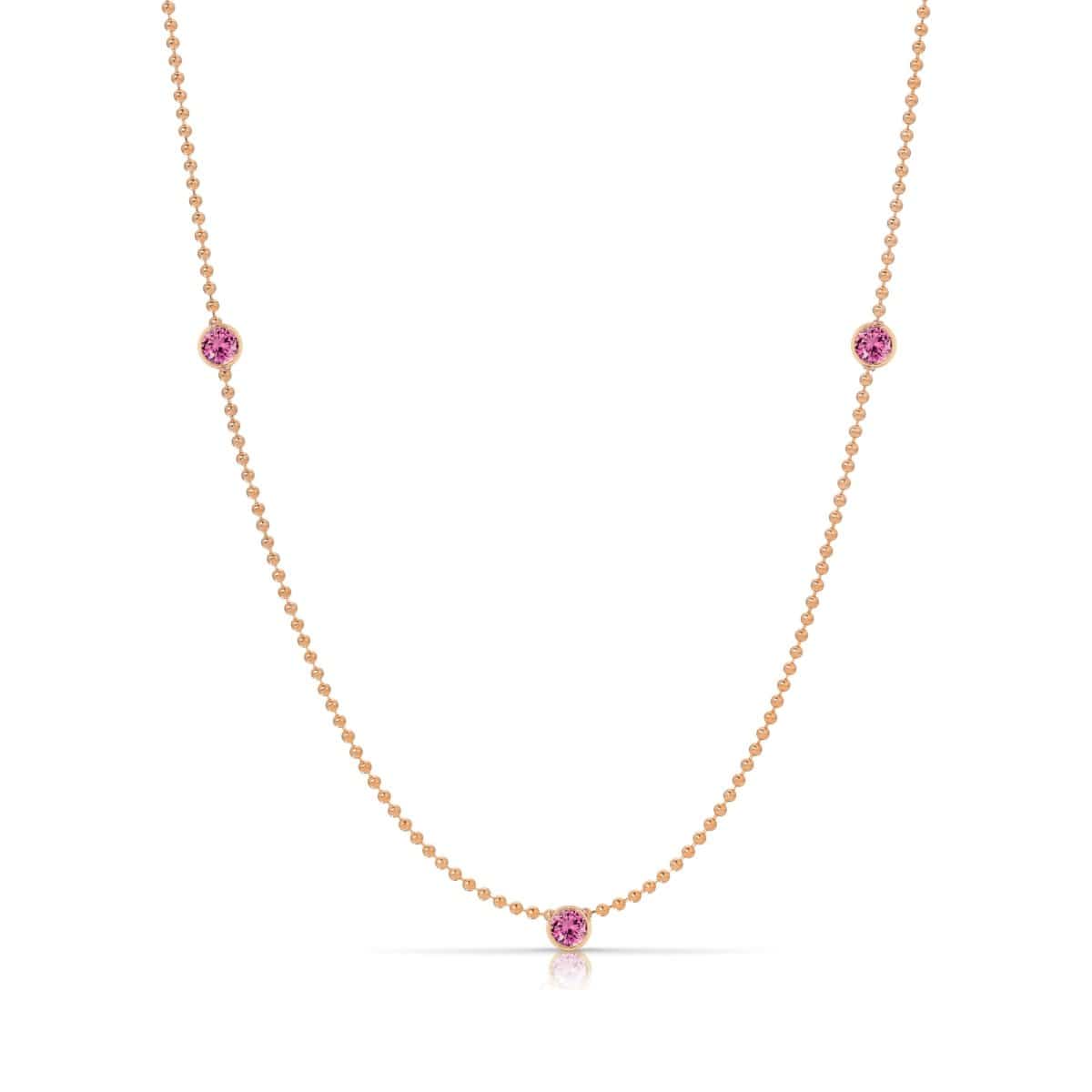 A Triple Birthstone Layering Necklace - Rose Gold in Pink Tourmaline - October on a white background.
