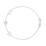A white gold Custom Gold Bracelet – 3 Letters with the letters D and M and a heart charm, on a white background. 