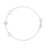 A white gold Custom Gold Bracelet – 3 Letters with the letters D and M and a heart charm, on a white background. 