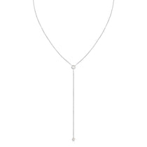 A Diamond Drip Necklace in white gold on a white background.
